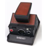 A Polaroid SX-70 camera, Model 2 Untested, sold as seen