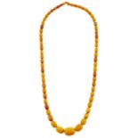 A necklace of amber and other beads, 47.9g