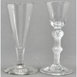 A George II wine glass, mid 18th c, the rounded funnel bowl on single series air twist stem with
