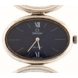 A stylish 1970's Omega silver elliptical lady's wristwatch De Ville, with blue dial and bracelet