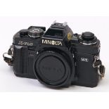 A Minolta X-700 MPS SLR 35mm camera body, with body cap and Minolta cap In apparently working order,