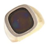 A black onyx signet ring, in gold marked 750, 15.7g, size W Stone loose in setting and slight wear