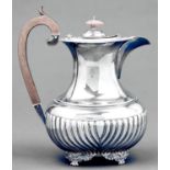 An Edwardian silver lidded jug,  with gadrooned rim, 24.5cm h, marks rubbed, London 1909, 21ozs