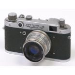 A Soviet Russian green body FED-2 SLR 35mm camera, made in USSR, with FED 5cm F2.8 lens In
