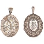 A Victorian oval silver locket, with c scroll border, 48mm excluding loop, by David and Lionel