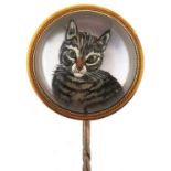 A Victorian reverse painted intaglio or 'Essex' crystal cat stick pin, in gold marked 18, base metal