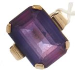 A 9ct gold synthetic sapphire ring, 8.9g size M