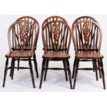 A set of six stained ash wheel back dining chairs, in Victorian style, seat height 46cm All chairs