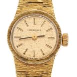 A Longines gold plated lady's wristwatch, with textured tapered bracelet, stainless steel back,