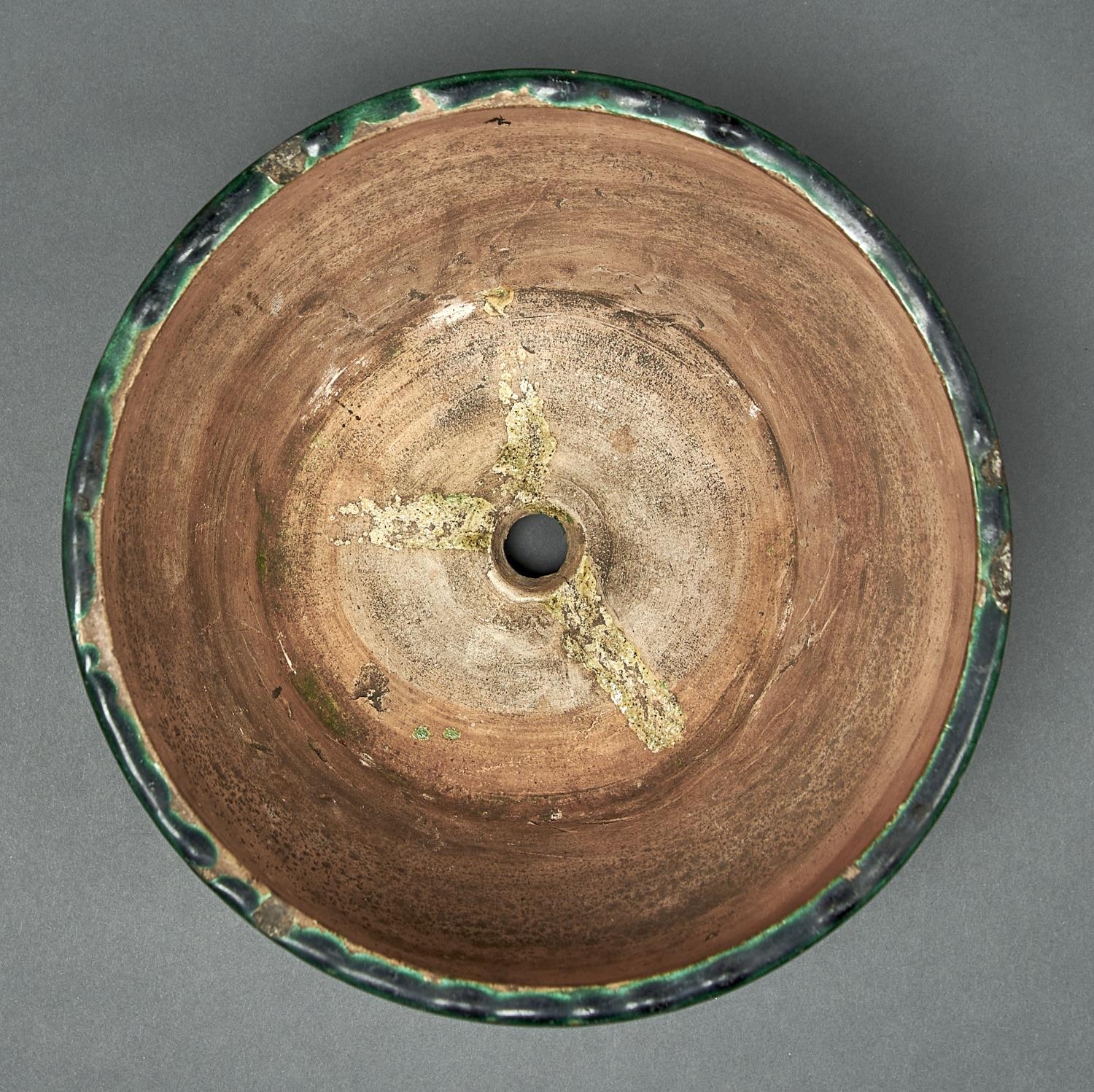 A Chinese green glazed biscuit tripod censer, Ming dynasty, early 17th c, the rounded sides - Image 2 of 2