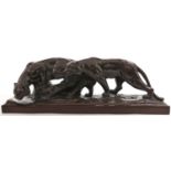 A bronze sculpture of lions, 20th c, in 19th c style, rich brown patina, 18cm h, 58cm l