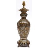 A French Japonisme etched and silvered brass oil lamp, c1885, on four bamboo shaped feet, adapted
