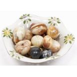 Fourteen onyx eggs and fruit, 20th c, various sizes