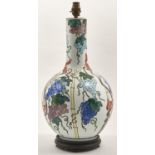 A porcelain bottle shaped vase, 20th c, decorated in Chinese 17th c style with squirrels and