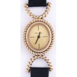 A Roy King 9ct gold oval lady's wristwatch, with cable surround and hinged lugs, mechanical