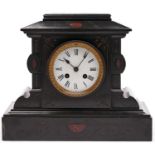 A noir belge mantel clock, late 19th c, of architectural form, with enamel dial and bell striking