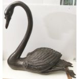 A bronzed metal sculpture of a swan, late 20th c, black patina, 63cm h