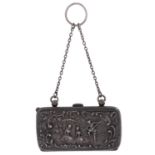 An Edwardian silver purse, embossed to the front with an 18th c scene, the back with an extensive