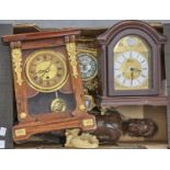 One French and two other mantel clocks, an African figure, an iron cannon ball, etc