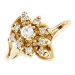 A diamond cluster ring, in gold marked 14k, 3.4g, size I