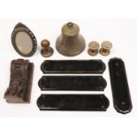 A bronze bell, 14cm h, finger plates and other door furnishings, etc