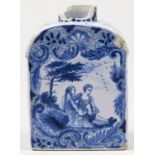A Dutch Delft tea caddy, painted to the front with a lady and gentleman seated beneath a tree, the