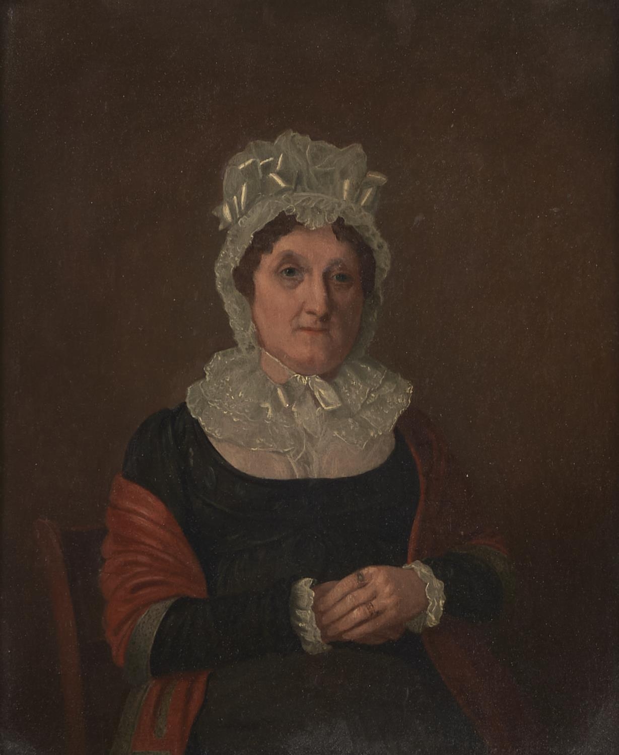 British School, 19th c - Portrait of a Lady,  seated half length in a black dress and lace cap,