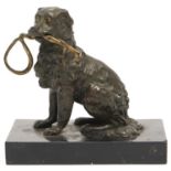 A bronze dog novelty inkwell, 19th c, carrying a gilt whip on nero belgio base, original brown