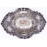 A Victorian pierced silver bonbon dish, die stamped with scrolls, 18cm l, Birmingham 1899, 4ozs