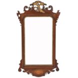 A Victorian inlaid and parcel gilt walnut fretted frame mirror, 91.5cm h