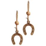 A pair of 9ct gold horseshoe earrings, 0.6g