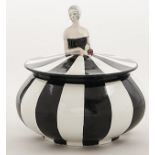 A Wiltshaw and Robinson Carlton Ware art deco figural powder bowl and cover, c1925-27, in the form