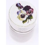 An Edwardian silver mounted glass salts jar, the guilloche enamel cap painted with pansies, stopper,