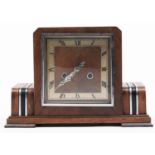 An art deco walnut veneered mantel clock, Enfield, c1930-40, the square dial with silver chapter