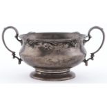 A George V silver sugar bowl, 15cm over handles, marks rubbed, Birmingham 1924, 3ozs