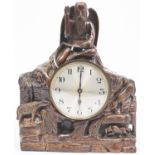 A carved oak mantel clock in the form of Father Time, early 20th c, 39cm h