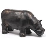 Studio Pottery. A stoneware hippopotamus, bronzed glazed, 34cm h