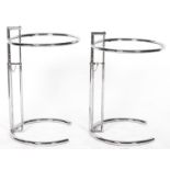 A pair of chromium plated tubular metal and glass round occasional tables, in art deco style, the