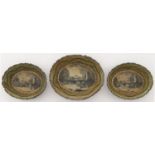 A set of three oval counter trays, Bois de Spa, Wallonia, c1790, painted en grisaille with a river