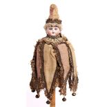 A French musical marotte, late 19th c, the bisque doll's head with blue glass eyes, painted