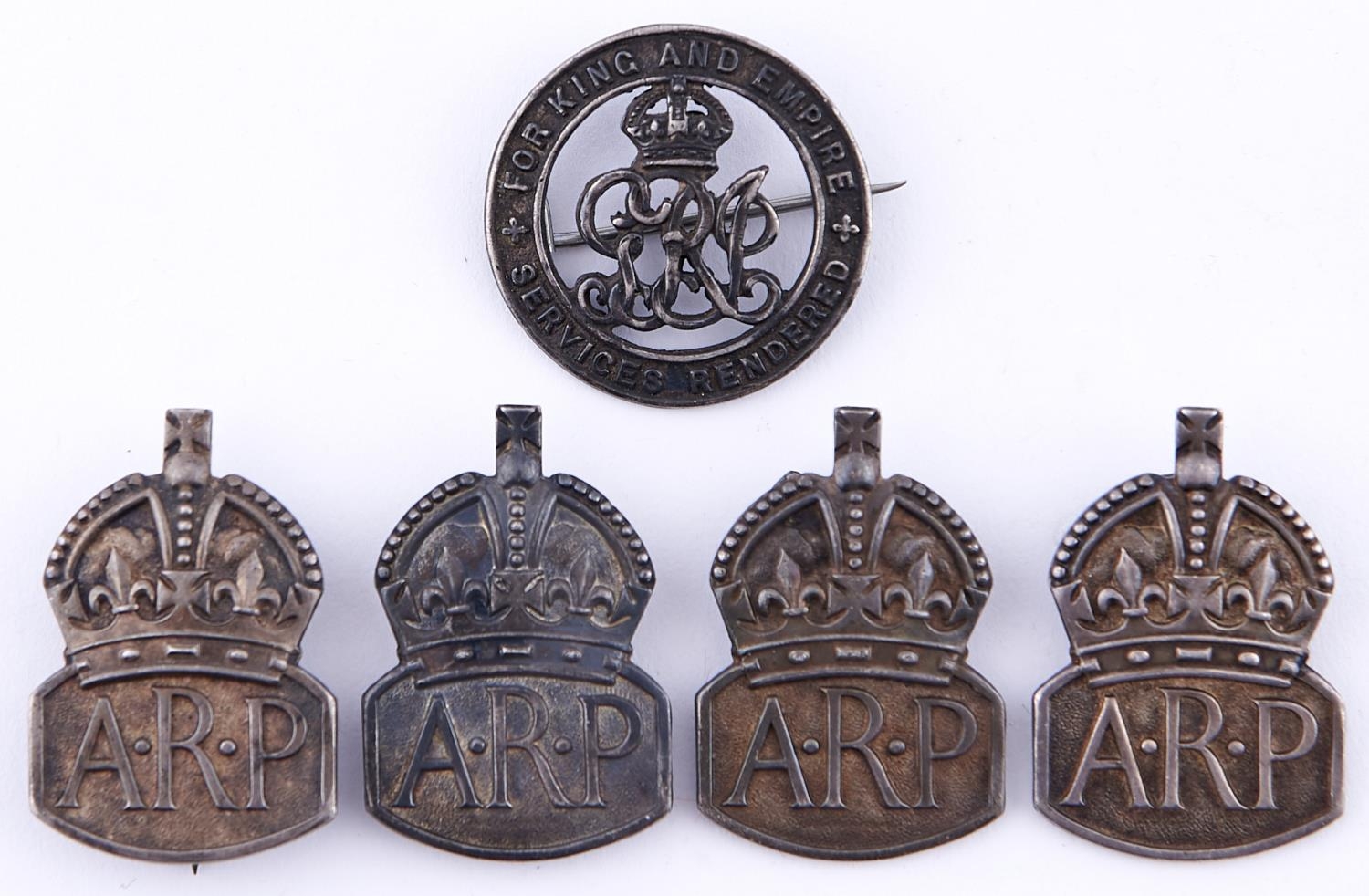 WWI Silver War Badge 179365 and WWII ARP silver badge, hallmarked 1938 or 1939 (4) (5)