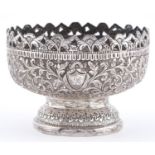 An Ottoman silver repousse footed bowl, 19th c, with pierced rim, 73mm h, marked in Arabic, 5ozs