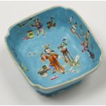 A Chinese turquoise ground famille rose shaped square footed bowl, Daoguang mark, 19th c, 12.5 x