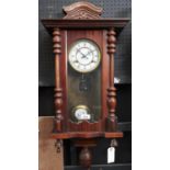 A mahogany-stained Vienna wall clock, c1900, with enamel dial, pendulum, 76cm h