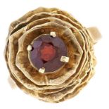 A garnet ring in the form of a rose, in gold marked 9ct, 5.3g, size M