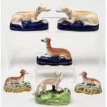 A rare Samuel Alcock bone china model of a fox, c1830-40, on tufted rocky green mound with gilt