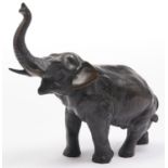 A bronze sculpture of an Asian elephant, 21cm h x 25cm w