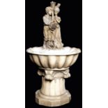 A marble effect resin fountain in the form of a youth and girl with their dog set in the centre of a