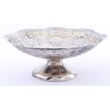 A George V pierced silver fruit bowl, on domed foot, 21.5cm diam, Birmingham 1934, 11ozs 10dwts