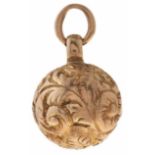 A gold sphere pendant, marked 9c, 2.7g